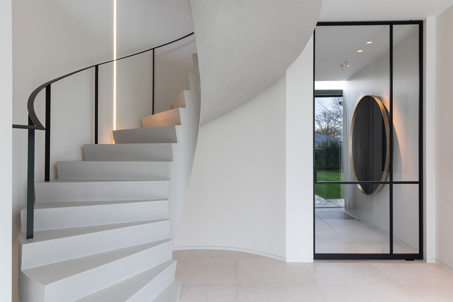 A spiral staircase in a modern home.